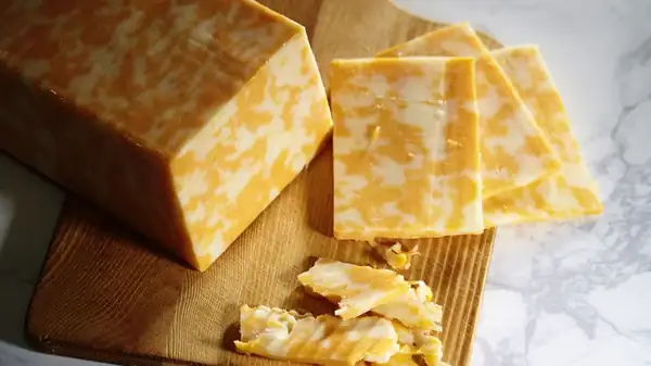 The Small Difference Between Colby Cheese And Cheddar Cheese