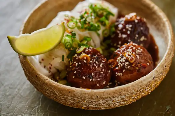 Teriyaki chicken dumplings with rice noodles