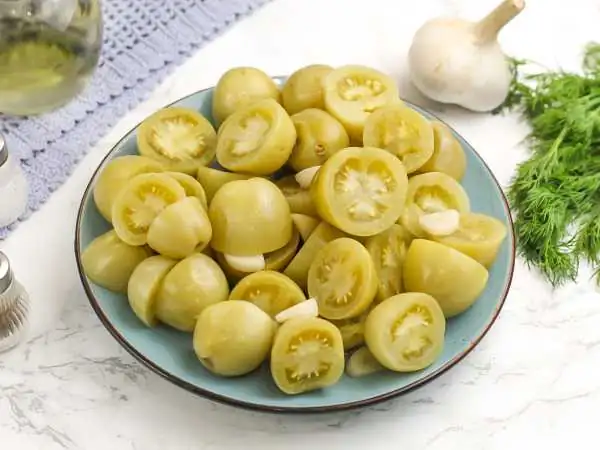 Pickled green tomatoes for the winter in jars (like barrel tomatoes)