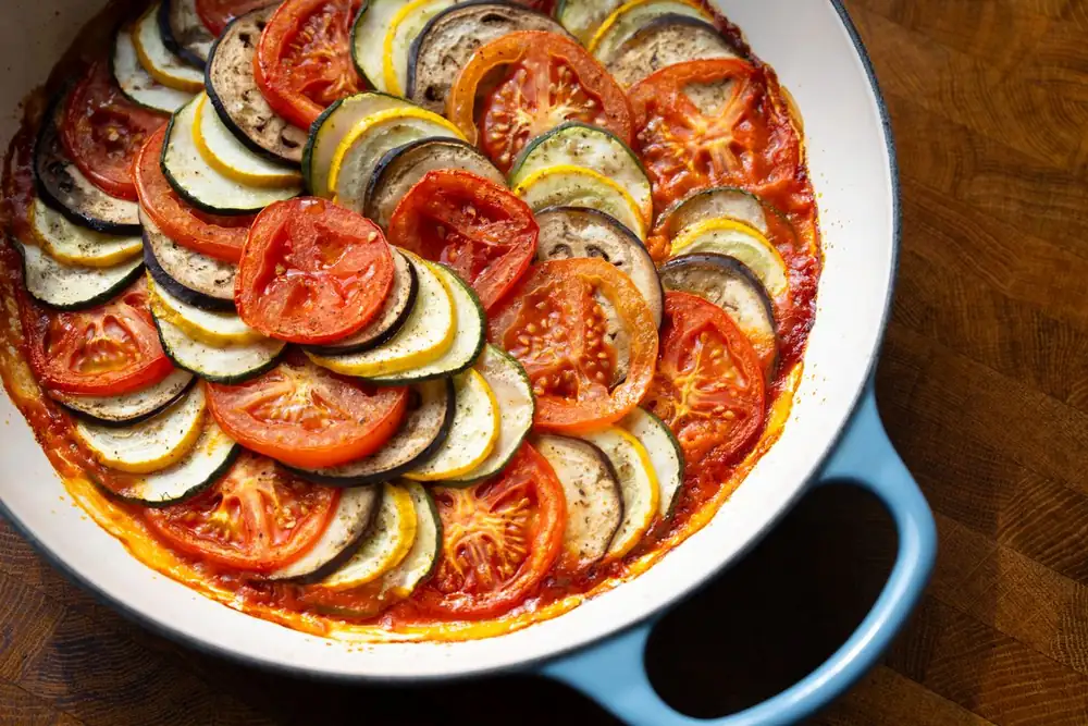 Oven-baked ratatouille with roasted bell pepper sauce