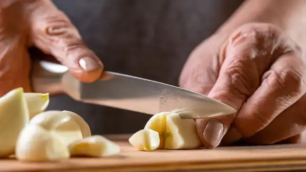 The intensity of garlic flavor depends on how it is chopped