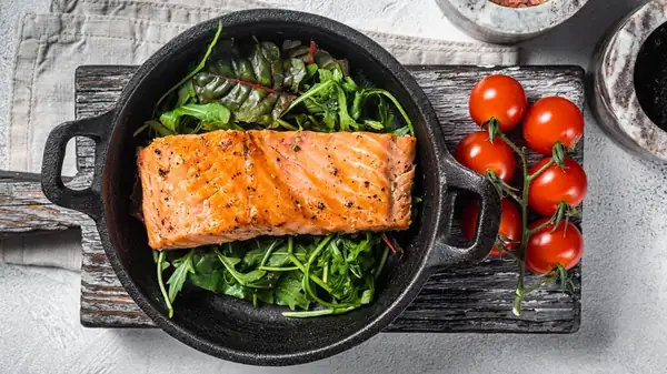 The crucial step when frying frozen salmon in a pan