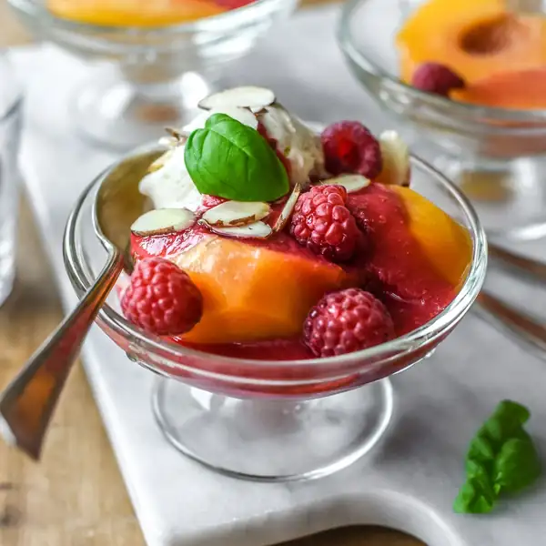 Poached Peaches with Raspberry Sauce and Vanilla Ice Cream (Pêches Melba)