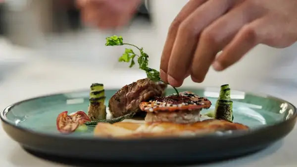 The timing of adding the fresh herbs changes the flavor of the dish.