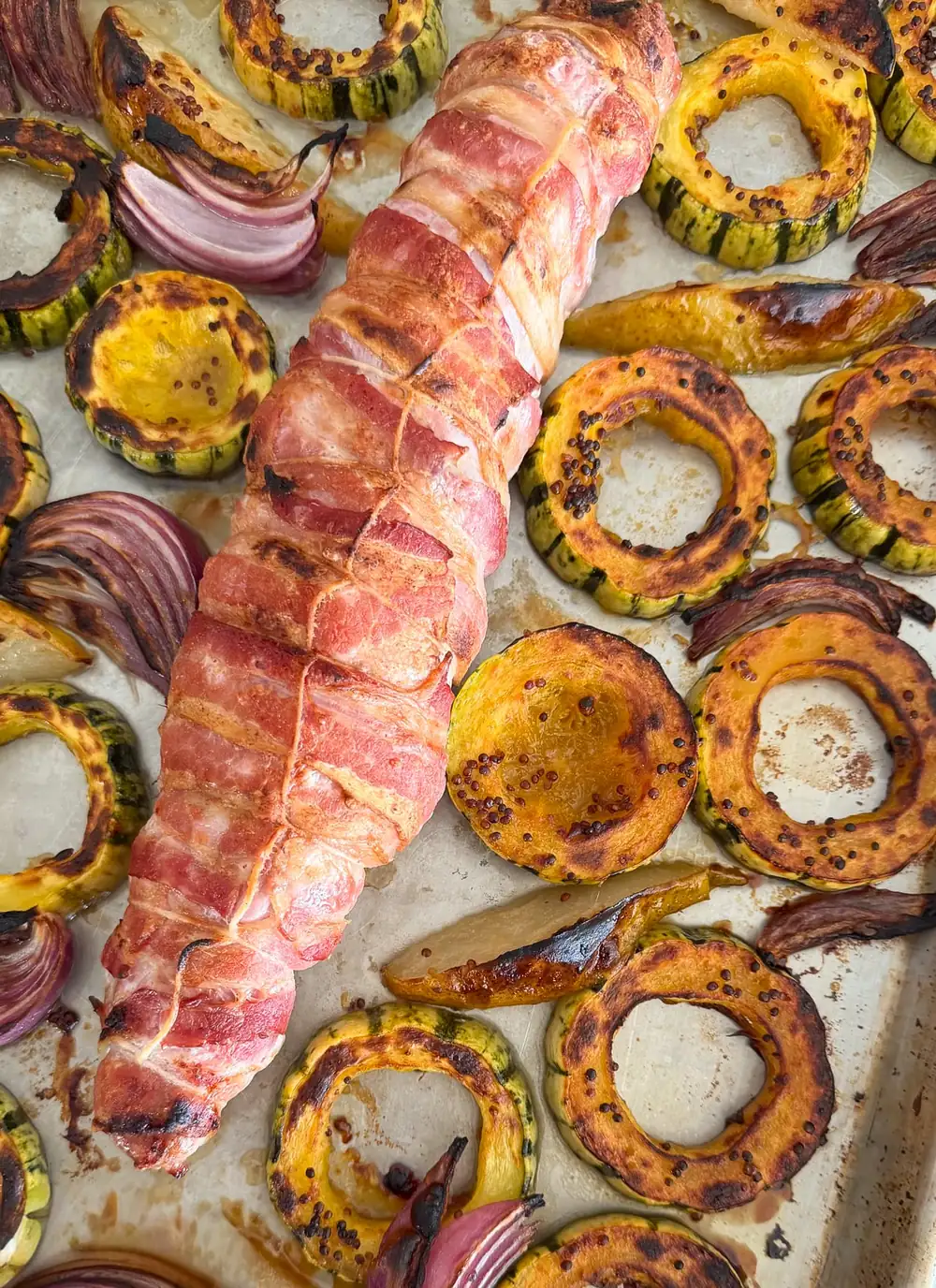 Bacon-wrapped pork tenderloin with delicata squash and pear