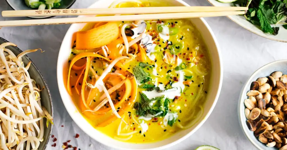 Turmeric coconut soup with rice noodles