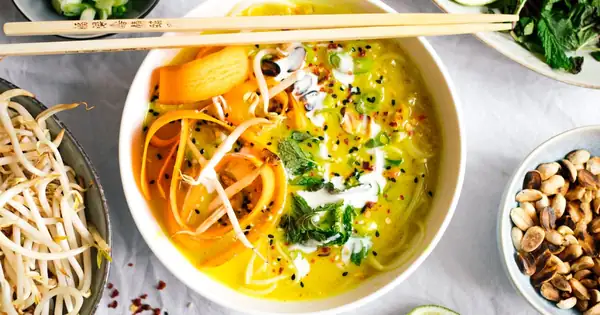 Turmeric coconut soup with rice noodles