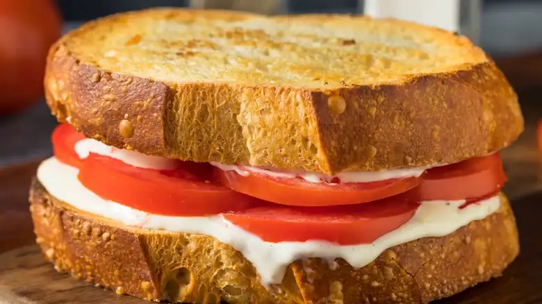 Give Tomato Sandwiches An Easy Flavor Boost With A Sprinkle Of This Greek Seasoning