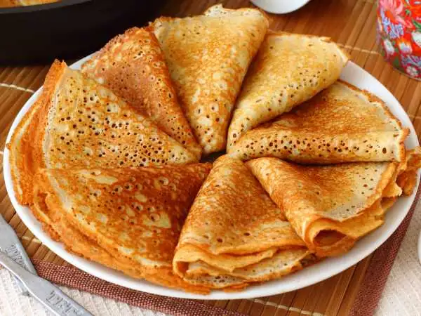 Lacy pancakes with kefir and milk