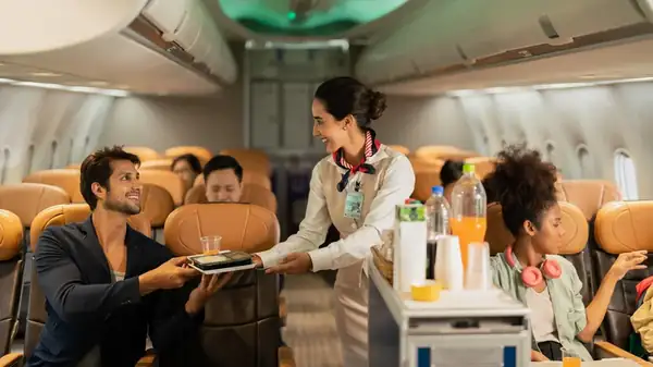 Why One Soda In Particular Tastes So Good When Flying