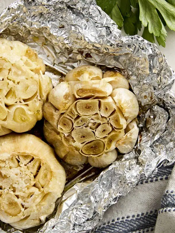Prep this easy roasted garlic for quick additions to meals all week!