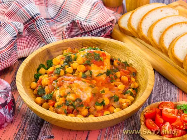 Chicken drumstick stewed with chickpeas and tomatoes