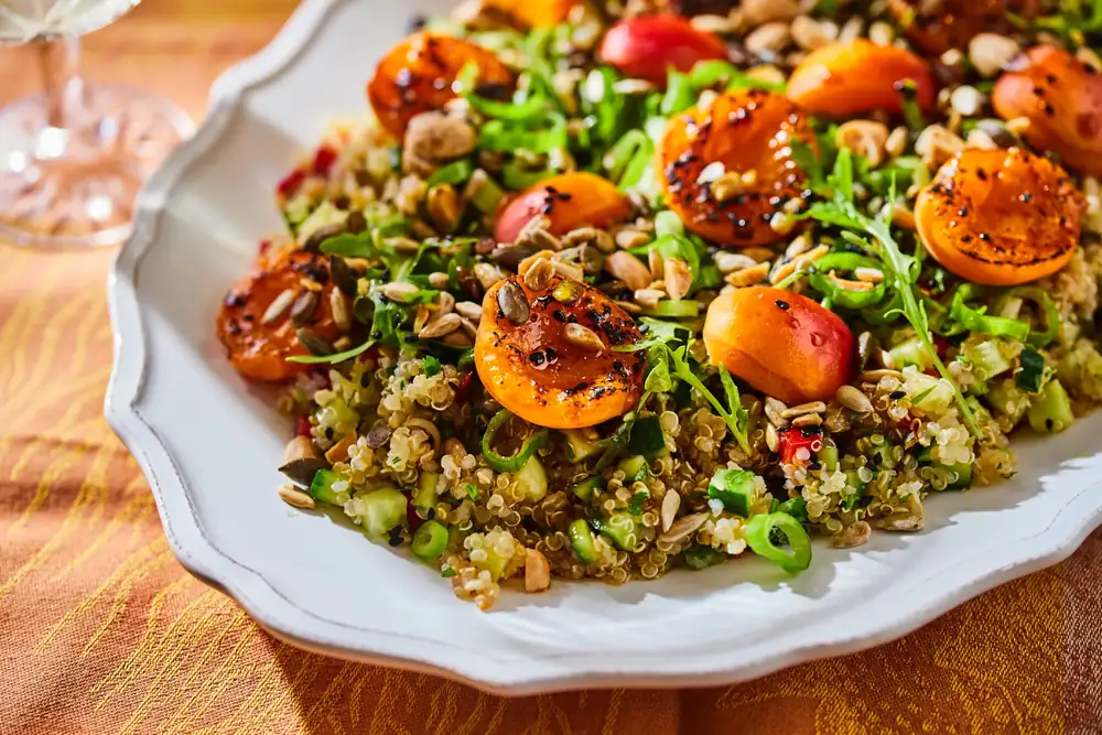 Multi-seed quinoa salad with grilled apricots