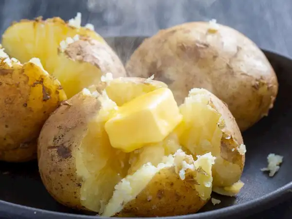 How to cook the potatoes for kumpir (baked potato dish)?