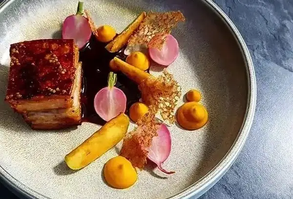 Pork Belly With Baked Radish, Carrot Puree and Caramelized Apples