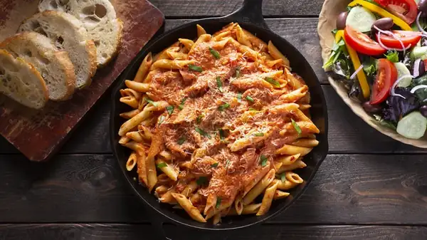 Why Vodka And Tomatoes Make The Perfect Sauce Pairing