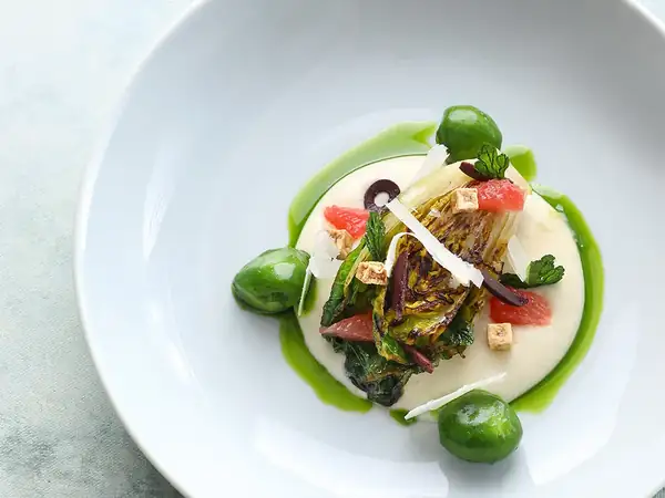 Romaine lettuce with Parmesan cream, grapefruit and parsley potatoes