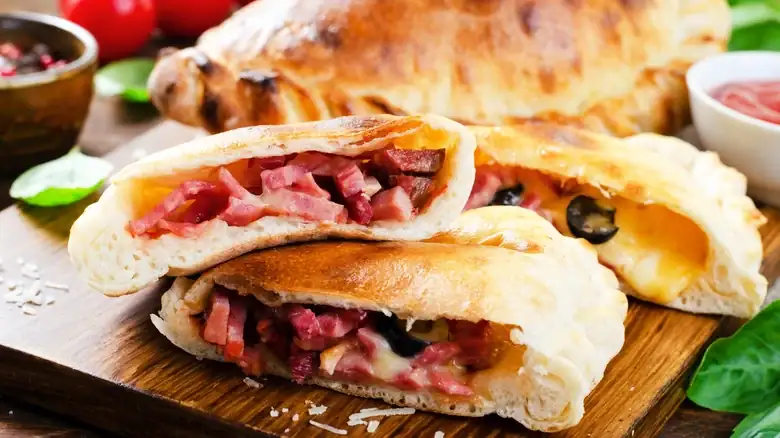 Calzones And Empanadas Look Similar, But They're Very Different Pastries