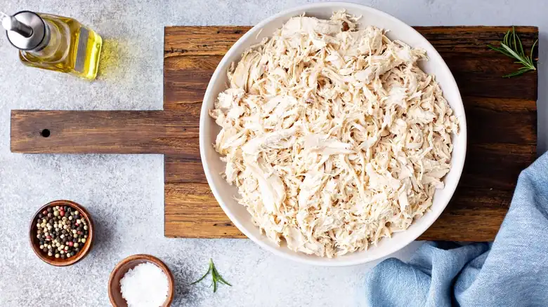 Poaching chicken yields juicy meat that shreds easily.
