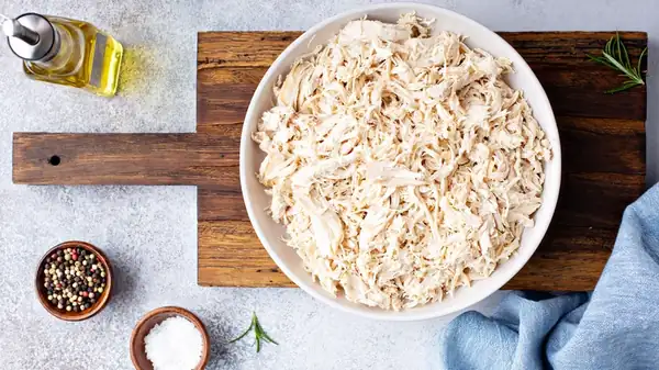 Poaching chicken yields juicy meat that shreds easily.
