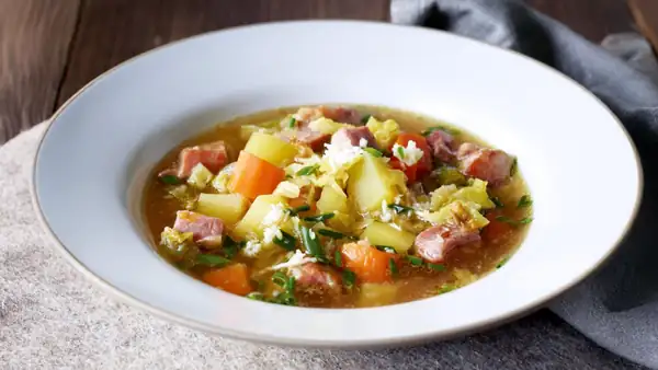 Savoy cabbage stew with potatoes and smoked pork loin