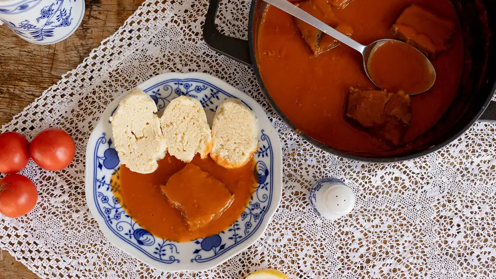 How to save tomato sauce that's too sour. Longer cooking, butter, and even regular baking soda will help