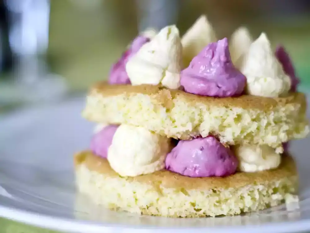 Recipe for a layered yule log with yuzu cream and raspberries